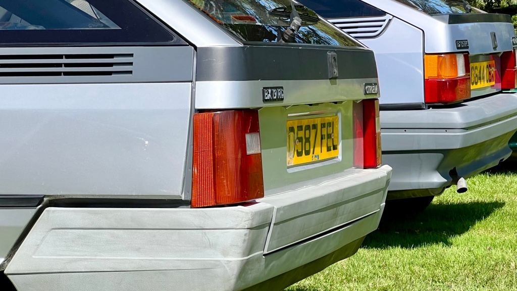 Different tails of two silver Citroën BX models - one Estate, one Hatchback