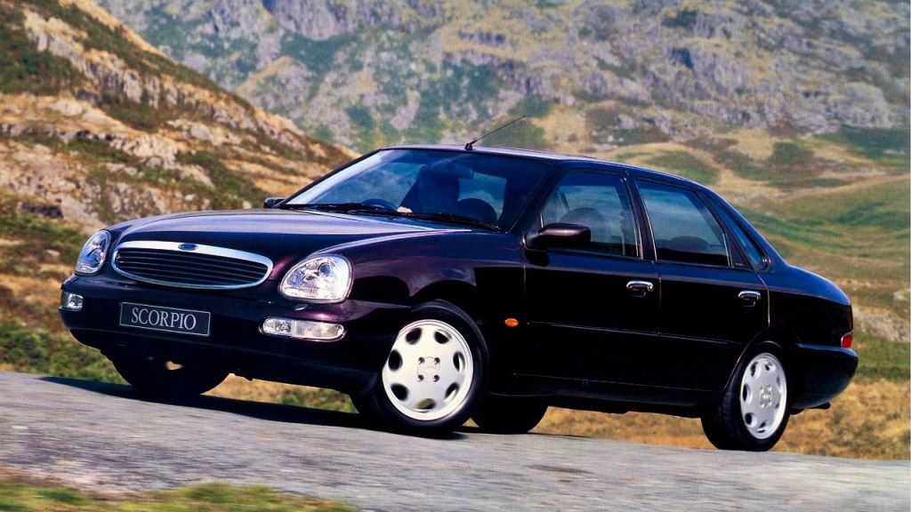 Front three-quarter of a dark purple Ford Scorpio Saloon