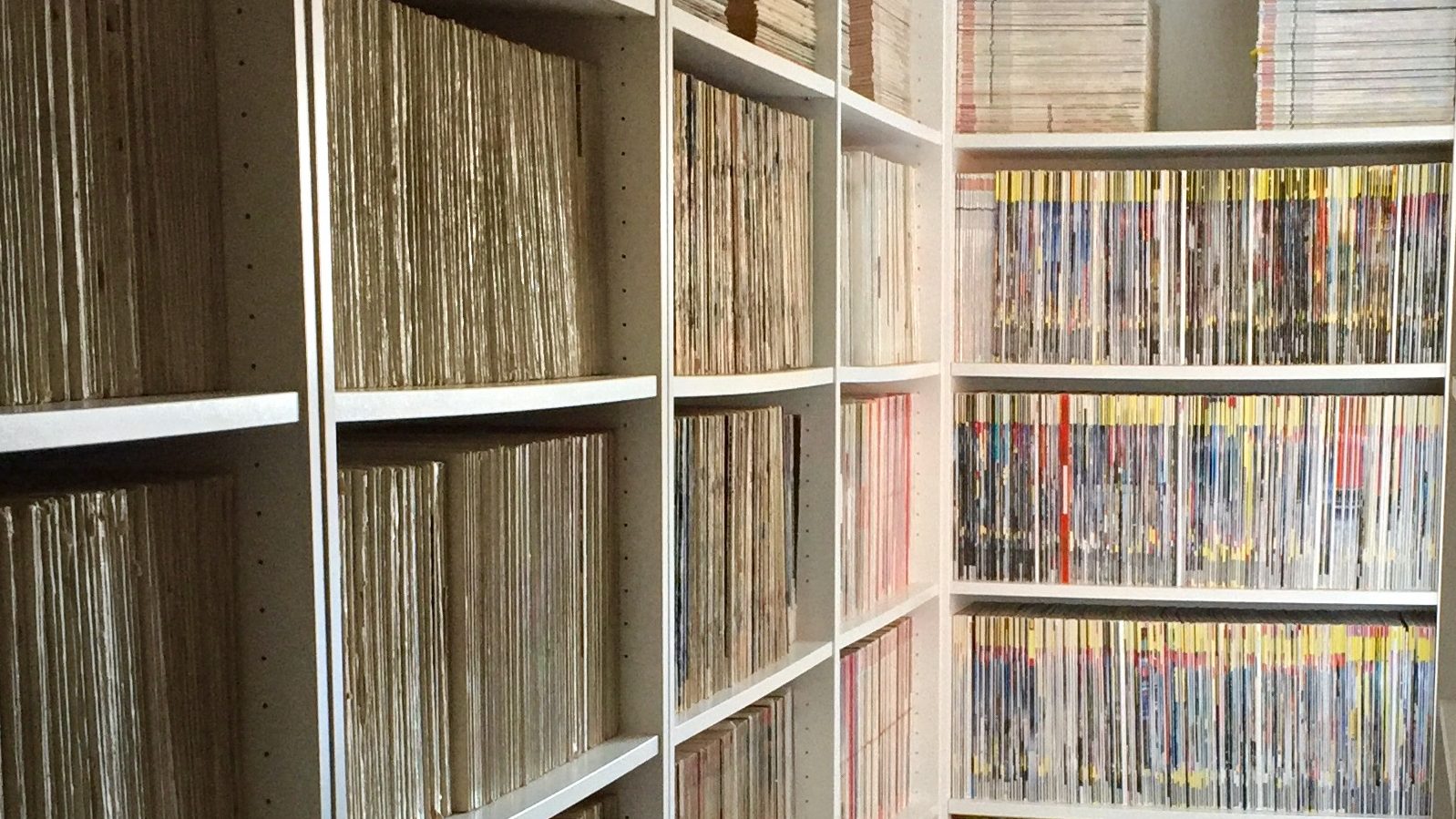 Archive shelving at the The Joy Of Specs containing post-WW2 Autocar magazines
